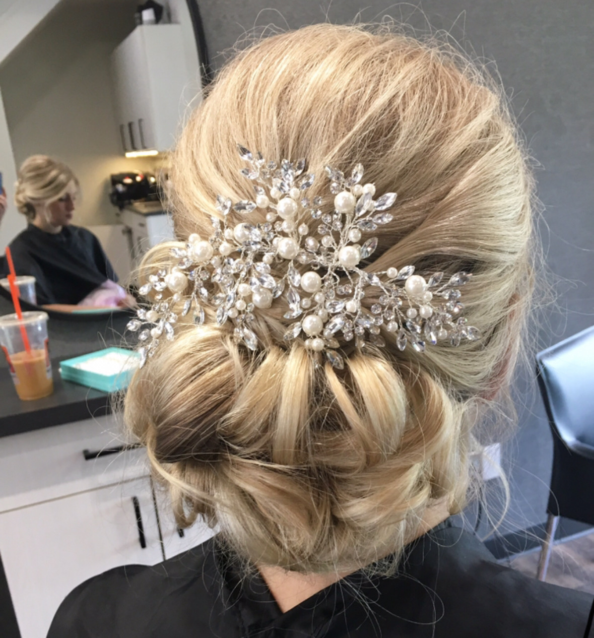 Bridal hairstyle with curls by Rickey Case